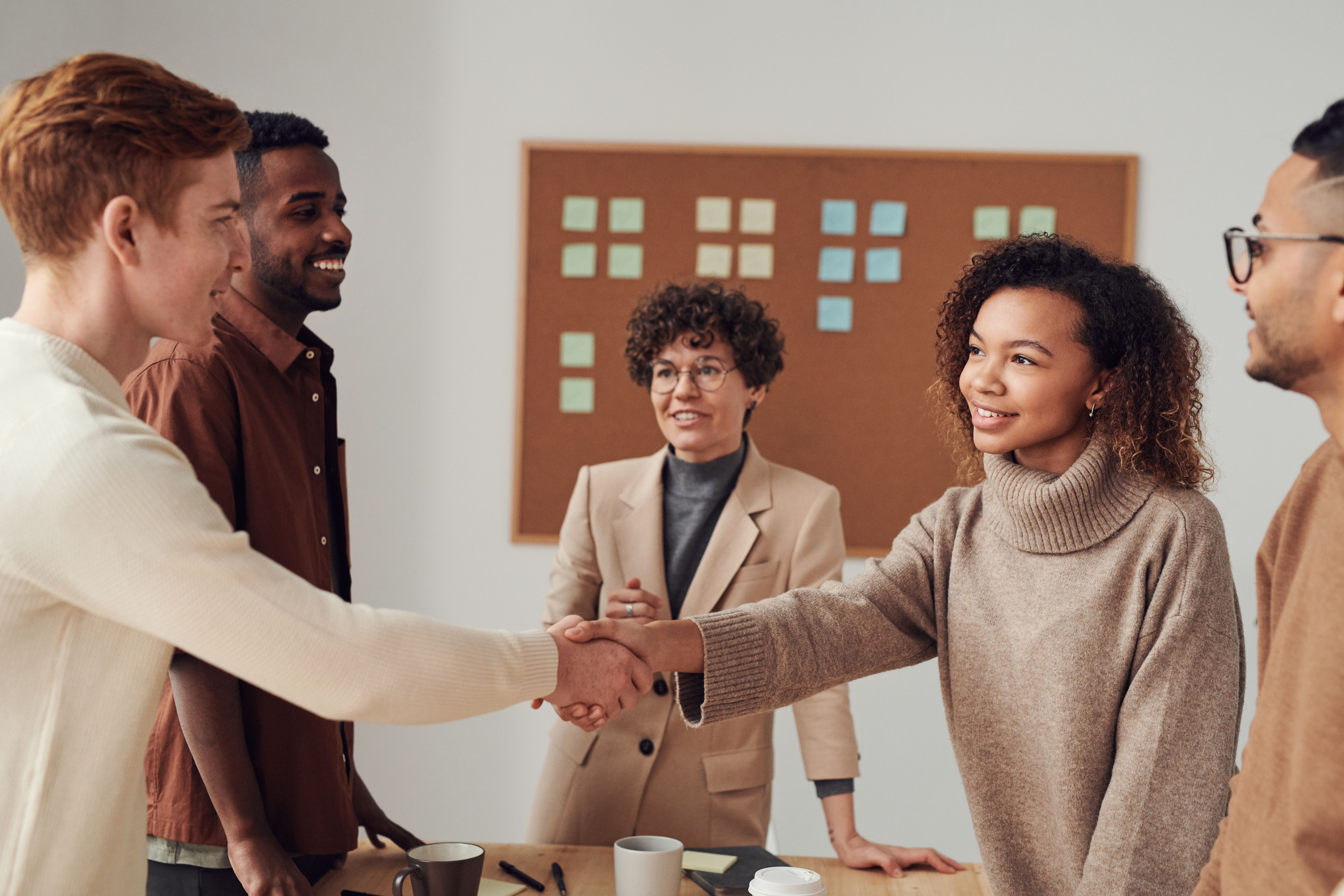 HumanRise consultants welcoming a newly placed candidate